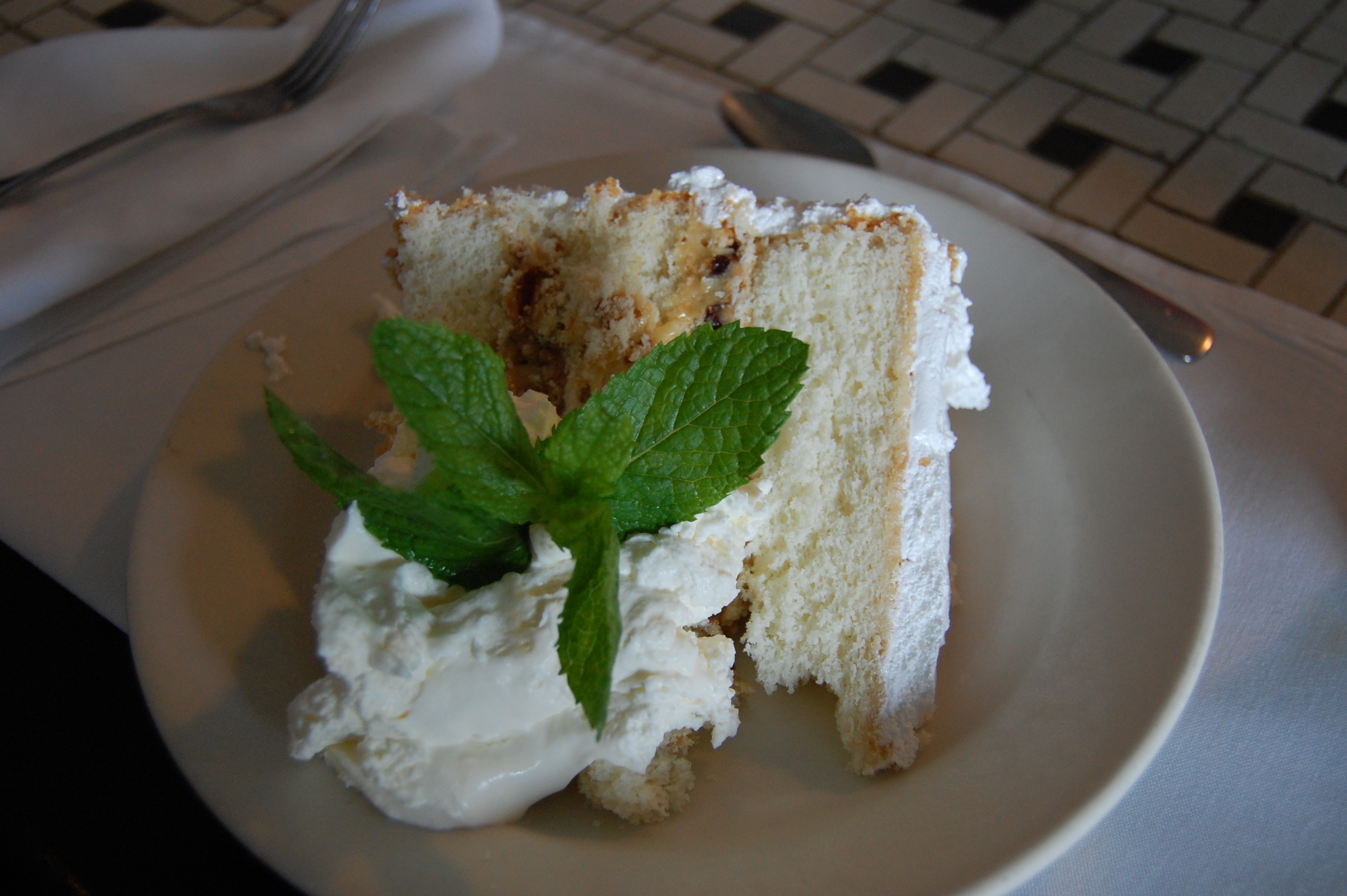 a thick slice of lane cake on a plate