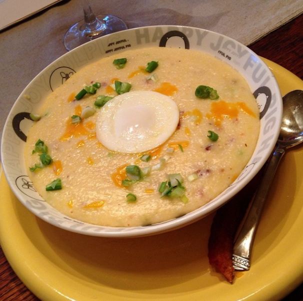 grits with cheese, bacon, green onion, and a poached egg
