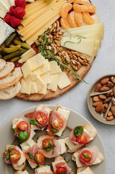 A charcuterie board filled with various food
