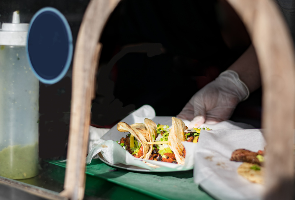 Tacos being served at a taco truck