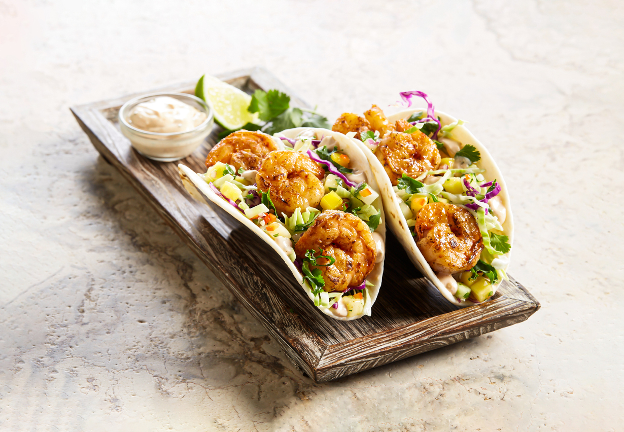 Grilled Shrimp Tacos with salad, lemon and mayo dip