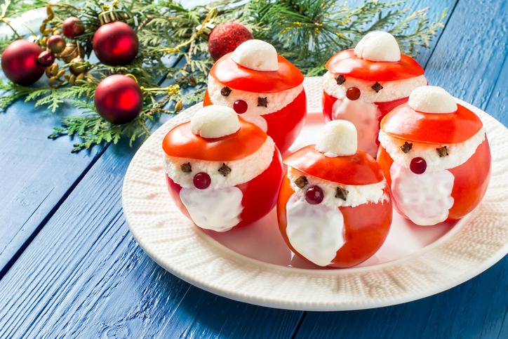 Stuffed tomatoes in form of Santa Claus for Christmas