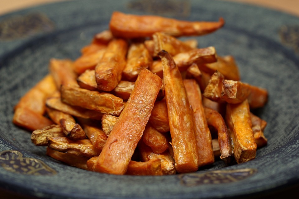 baked sweet potato fries on a plate