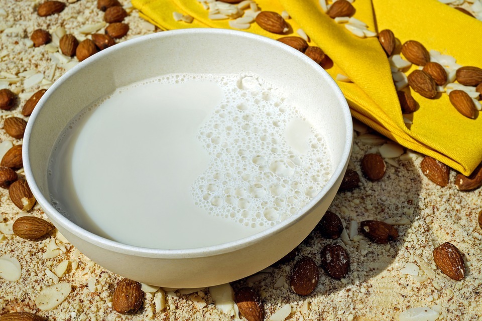 organic almond milk in a white bowl