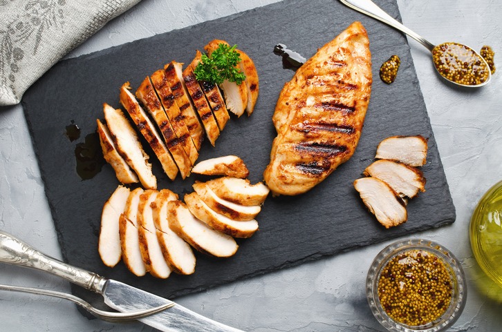 Grilled chicken fillets in a spicy marinade