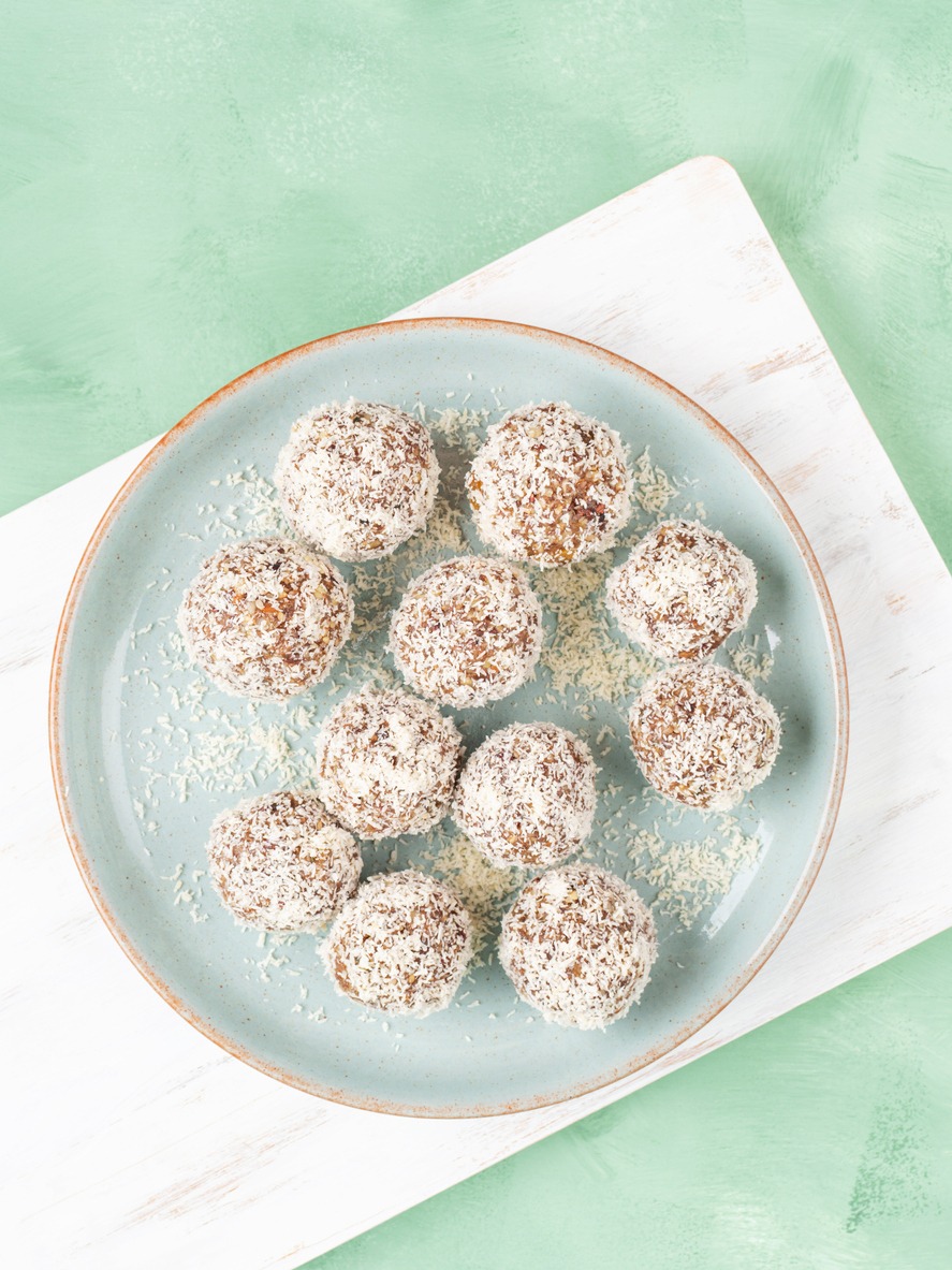 Home made energy protein balls with coconut flakes and nut butter