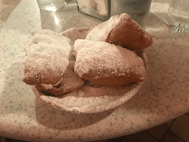 a plate of beignets