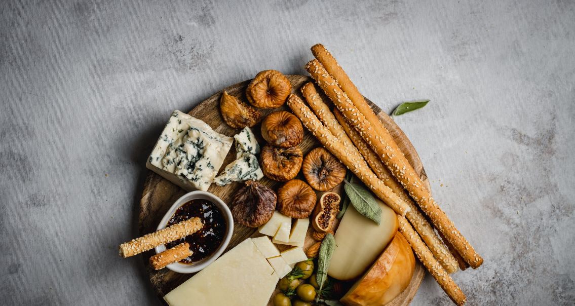 cheese board with bread and crackers
