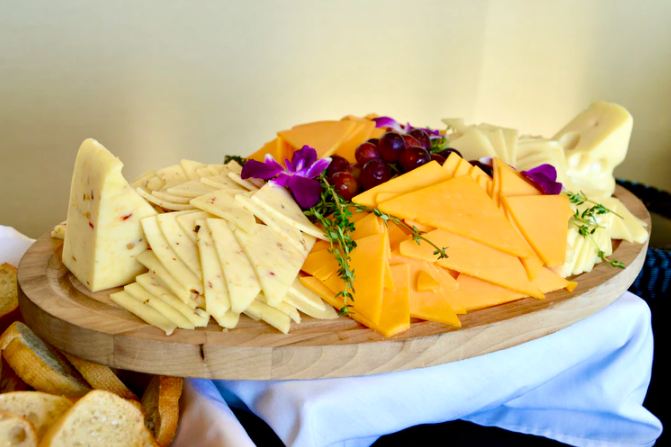 different types of cheese on a cheeseboard